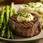 Discover Plated filet mignon with garlic butter, asparagus, and mashed potatoes